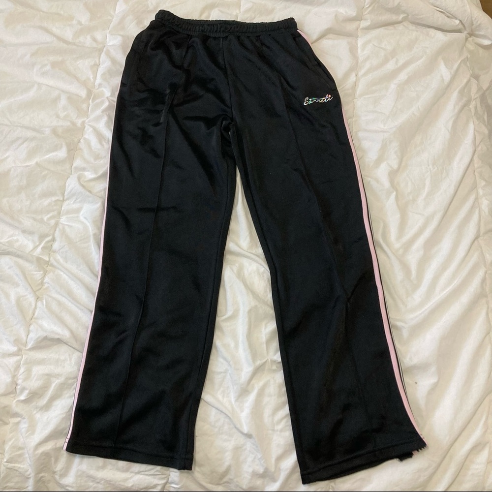 Worn twice.Loose fit casual pants, black,13-15 girls, fits like m in womens.